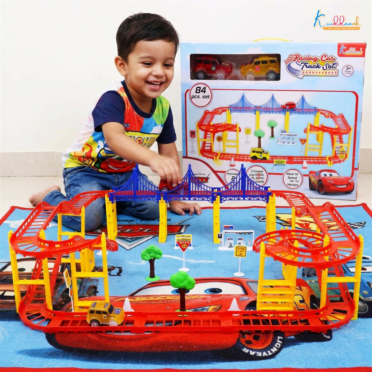 Car Track Medium (84 Pcs) Disney Cars Theme Race Track Set with 2 Diecast Cars, Bridges, Road Signs & Petrol Pump - Battery Operated DIY Racing Play Set for Kids 3+ Years
